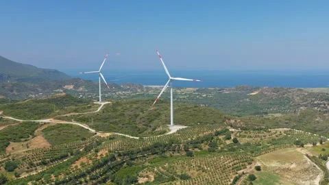 Windmills producing renewable energy from wind Vídeos de archivo 270240460