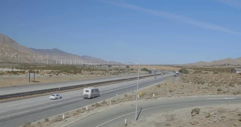 Windmills by the Road Stock Footage 114681712