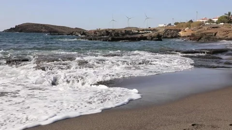 Windmills on the shore Video stock 106326971