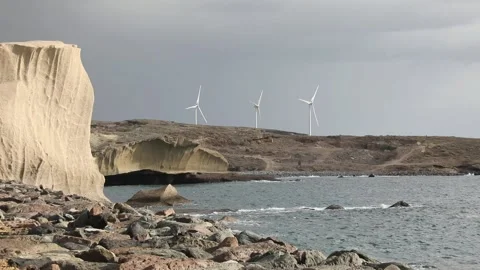 Windmills on the shore Stock Footage 106326979