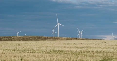 Windmills storm clouds 4.7K 95fps handheld Video stock 237417622