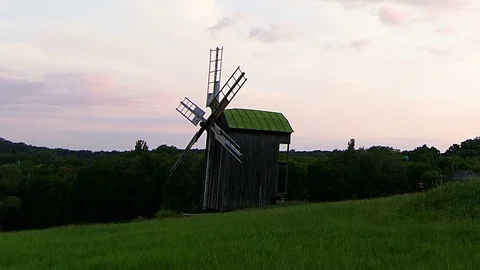 Windmills at sunset Video stock 97019561