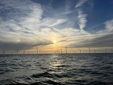 Windmills at sunset at Markermeer Stock-Fotos