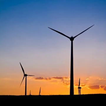 Windmills with sunset Stock Photos
