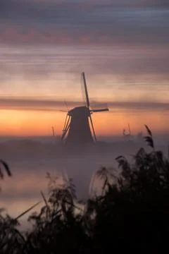 Windmills at sunset Foto stock
