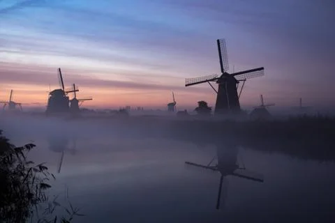 Windmills at sunset Foto stock