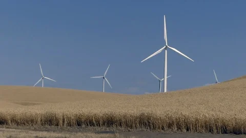 Windmills turning in slowmotion Stock Footage 112047996