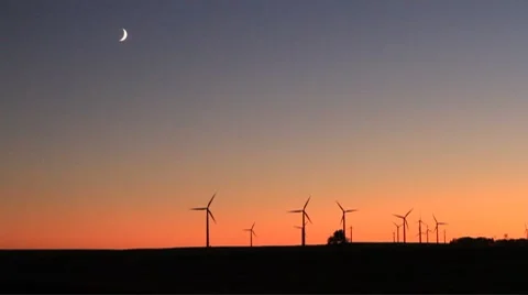 Windmills under moon at dusk Stock Footage 8775650