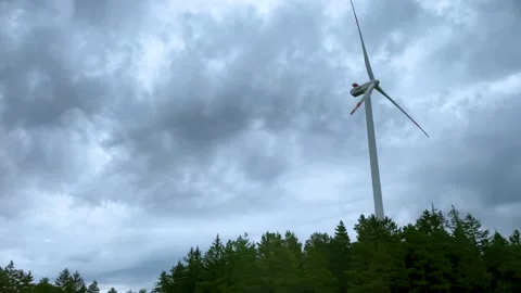 Windmills. View of wind turbines on a hill on a cloudy day near Munich Stock Footage 286239463