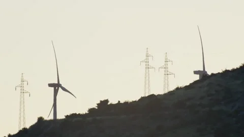 Windmills that will generate electricity at sunset. Stock Footage 208673446