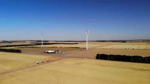 Windmills on a Wind Farm Producing Clean Renewable Energy Stock Footage 102249927