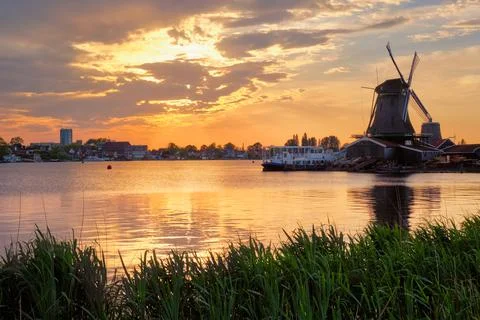 Windmills at Zaanse Schans in Holland on sunset. Zaandam, Nether Stock Photos