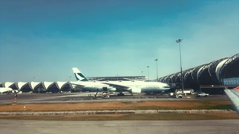 Windor view After Air Planes landing at thailand airport Stock Footage 74958735