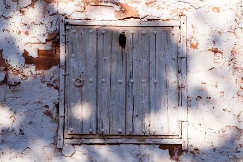 Window in abandoned adobe wall Stock Photos