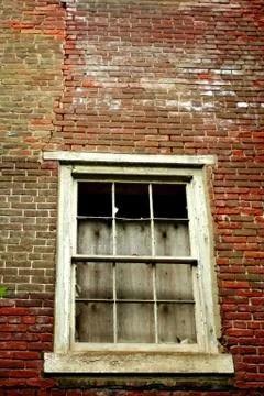 Window on a abandoned building Stock Photos