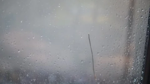 A window adorned with water droplets Video stock 300427046