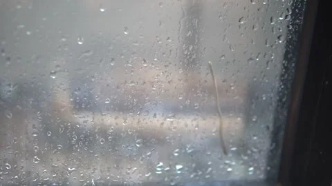 A window adorned with water droplets Stock Footage 300427098