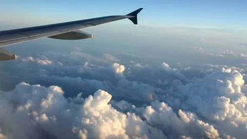 Window airplane with clouds video  Video stock 276558128