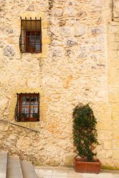 Window on the ancient wall Stock Photos
