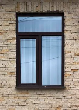Window and Wall of an Old Stone Cottage House close up Foto stock