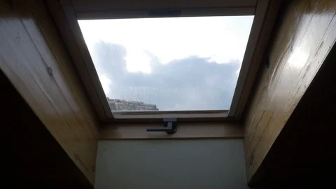 Window attic sky moist humidity clouds room wood loft ventana Stock Footage 112803264