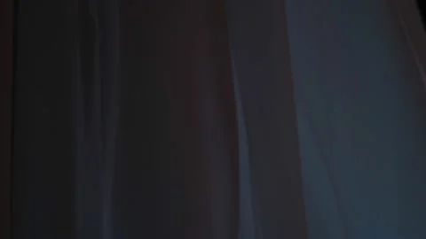 Window with the background of the night. curtains fluttering in the wind. Stock Footage 202084522