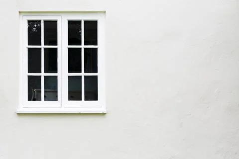 Window background, timber windows on a house, UK Stock Photos