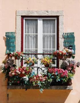 Window balcony with flowers Stock Photos