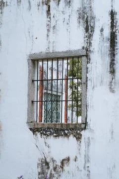 Window with bars in a building in Macau Stock Photos