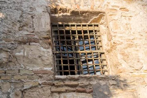 Window bars in facade of old house Stock Photos