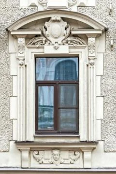 Window with bas-relief. Stock Photos