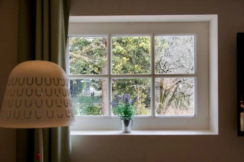 A window in the bedroom. Stock Photos