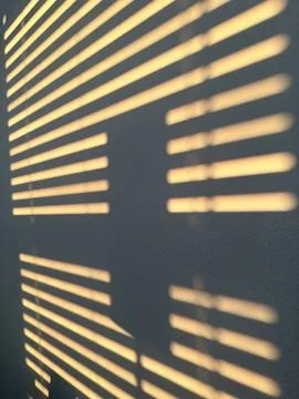 Window Blind Shadows on Wall Stock Photos