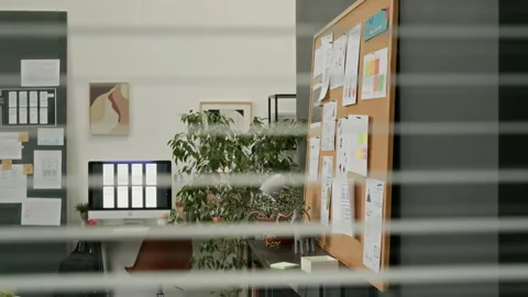 Window Blinds View of Office of UX Design Company Stock Footage 327900817