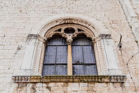 A window with a blue frame and a black frame in Gubbio, Umbria Italy Stock Photos