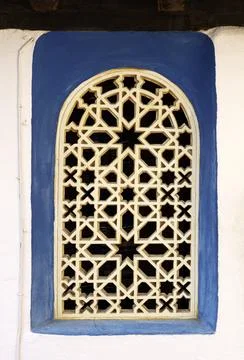 Window with a blue frame Stock Photos