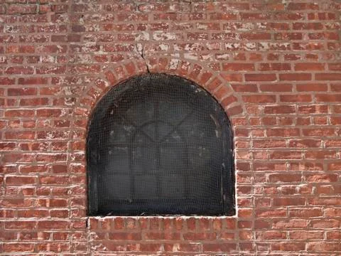 Window on the brick wall Stock Photos