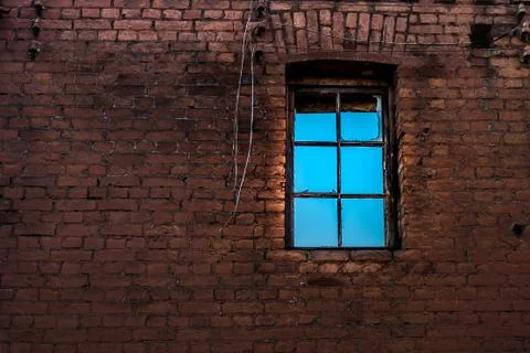 Window at the brick wall Stock Photos