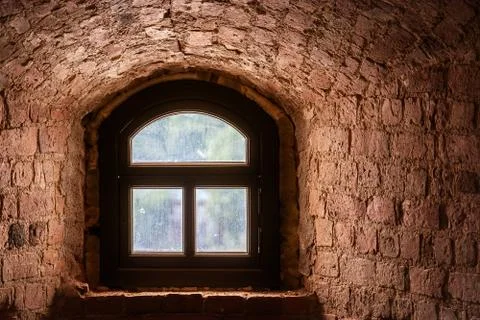Window in a brick wall. Stock Photos