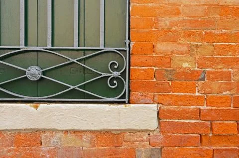 Window in a brick wall Stock Photos