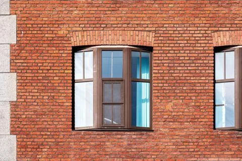 Window on a brick wall. Stock Photos