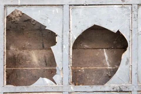 Window with broken glass Stock Photos
