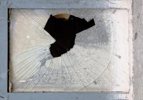 Window with broken glass Stock Photos