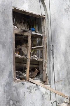Window broken by terrorists bomb attack near Nariman house in year 2008 ; ... Stock Photos