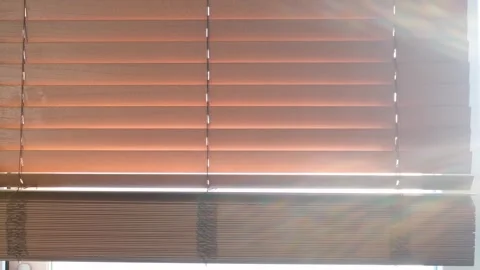 Window with brown wooden blinds close-up front view. Stock Footage 292862893
