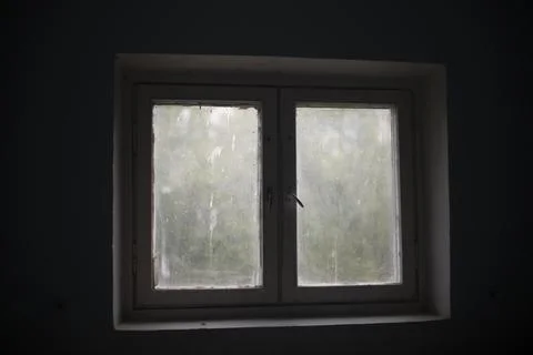 Window in building. Interior details. Window in dark room. Stock Photos