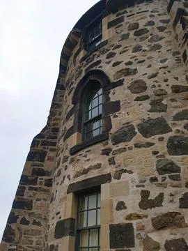 Window on Castle Tower. Brick Texture Castle. Stock Photos