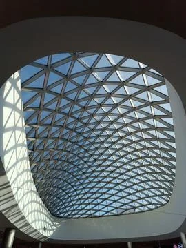 Window in the ceiling of a building made of rhombuses, geometry Stock Photos