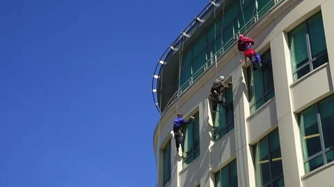 The window cleaner at an office building Stock Footage 52964977