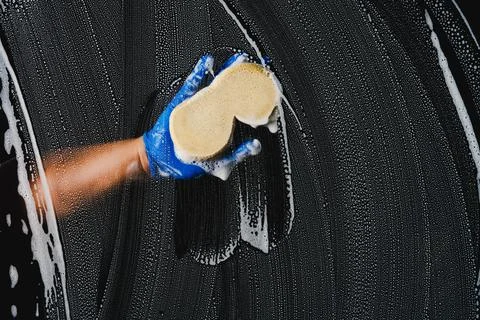 Window cleaner with sponge cleaning Foto stock